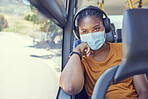 Travel, face mask and black woman with headphones on a bus driving to work during a pandemic. Public transport, covid and African girl listening to music, radio or podcast while on a journey or trip.