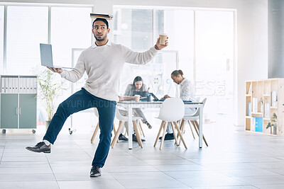 Buy stock photo Balance, multitask and busy with a business man carrying a laptop, book and coffee in the boardroom. Assistant, overworked and one leg with a male employee multitasking during a meeting in the office