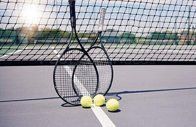 Tennis, sport and tennis ball with racket on tennis court with net background and fitness outdoor lens flare. Sports equipment, training and stadium outdoors with sunlight and physical activity.
