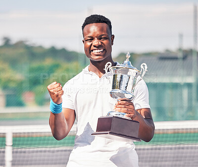 Buy stock photo Celebration, tennis and black man with trophy on court after success, achievement and winning tournament. Fitness, champion and tennis player with award from win in sports game, event and competition