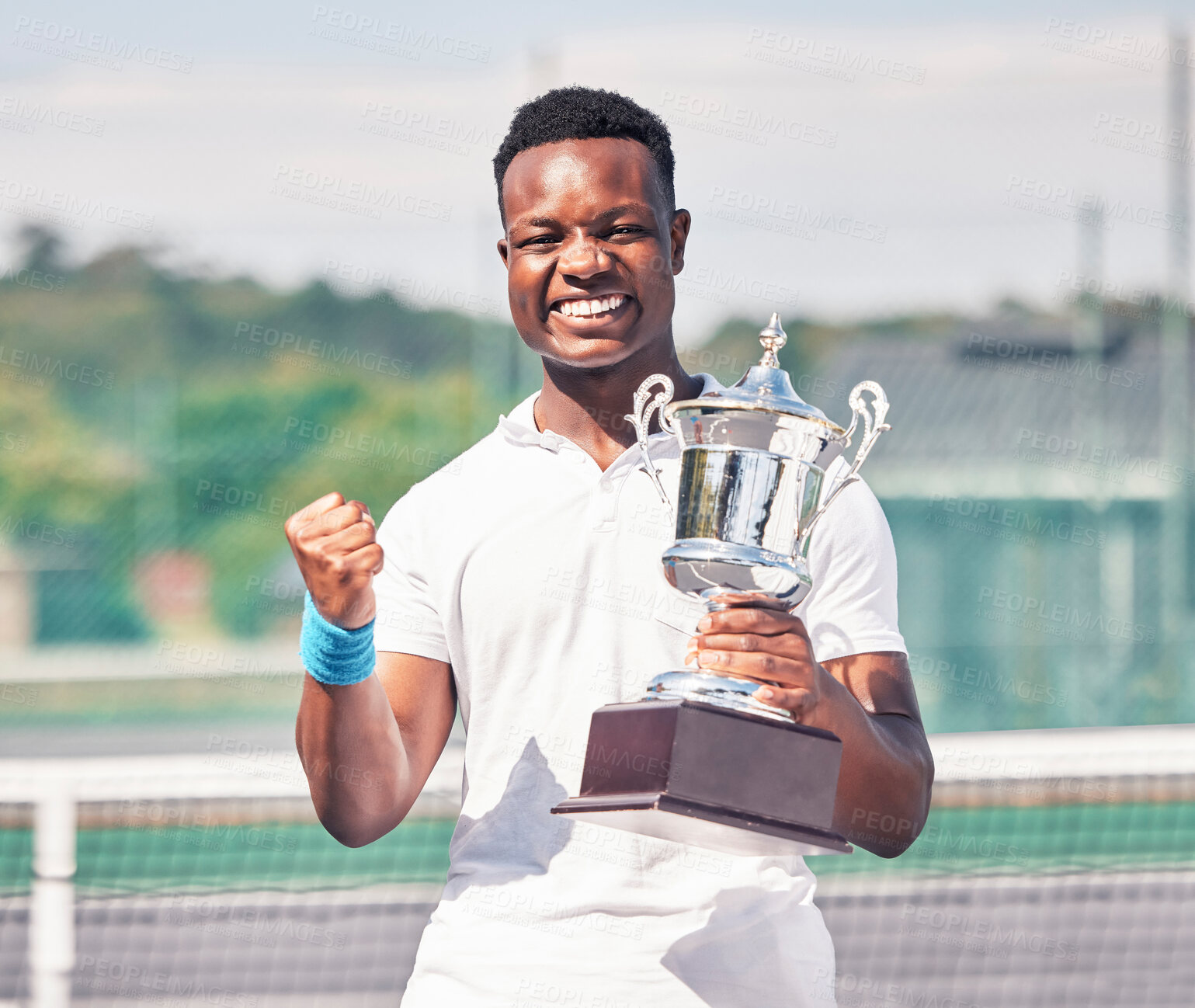 Buy stock photo Celebration, tennis and black man with trophy on court after success, achievement and winning tournament. Fitness, champion and tennis player with award from win in sports game, event and competition