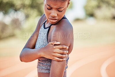 Buy stock photo Arm injury, fitness and black woman runner after training, exercise and running accident outdoor. Muscle pain, sports bruise and workout inflammation after sports on a outdoor run field of an athlete