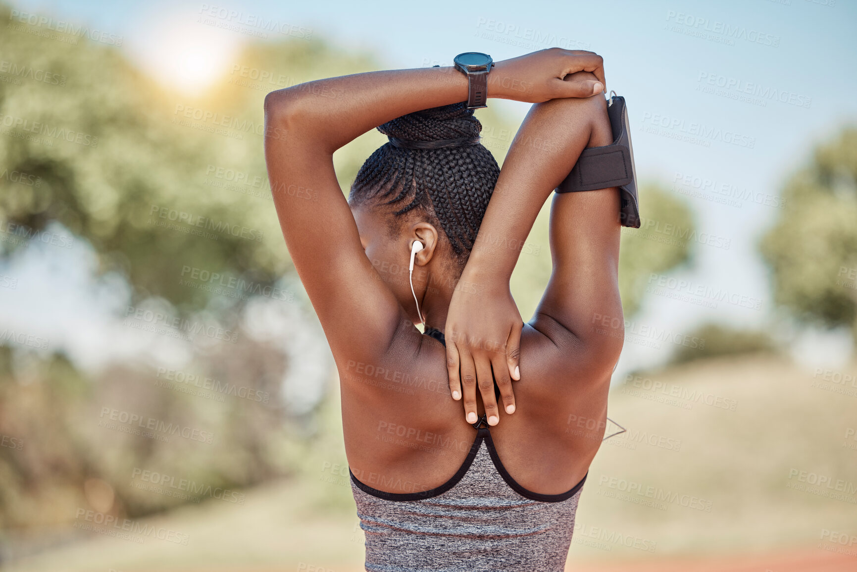 Buy stock photo Fitness, wellness or black woman stretching arm for exercise warm up, cardio workout or training at nature park. Back view, runner or athlete girl with health stretch, sports or running marathon