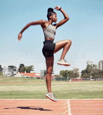 Buy stock photo Fitness, jump or black woman runner on a race track in training, cardio workout or sports exercise in summer. Jumping, running and healthy African girl sprinter on a mission for goals in a stadium 