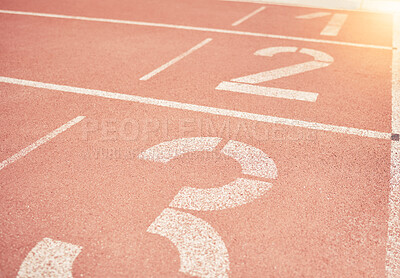 Sports, athletics and number on race track in stadium for training, sprint and running start position. Texture, ground and running track with nobody for fitness, exercise and workout for sport event