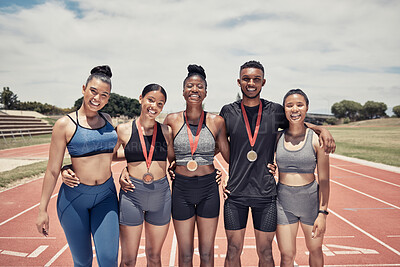 Buy stock photo Portrait, diversity and team for sports winner, for competition and group smile together outdoor. Teamwork, fitness training and medals for games, success and victory for embrace, happy and on track.