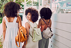 Friends, happy and travel holiday, summer and walking outdoor in Cuba, bag and beauty with afro and tropical weather. Young women, latino and walk on vacation, happiness and enjoy travelling outside