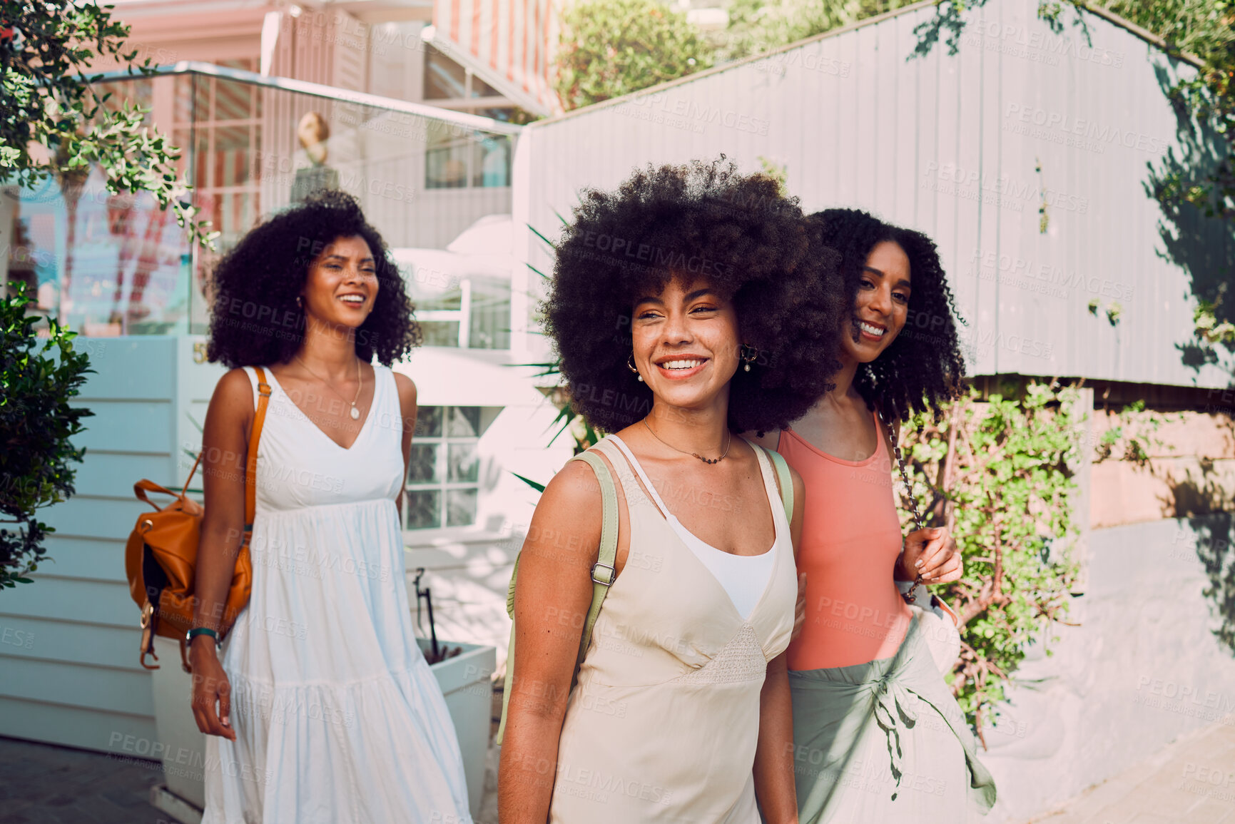 Buy stock photo Travel, friends and black woman in summer walking by the countryside or neighborhood with outdoor fashion, wellness and youth lifestyle. Happy gen z, women or group of people with adventure and smile