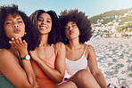 Woman group, beach vacation and lips blow kiss with happiness, sunshine and natural african hair. Happy black woman, friends and ocean sand in portrait pouting, bonding and together on summer holiday