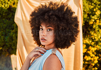 Buy stock photo Garden, luxury fashion and portrait of black woman in with bush backdrop and plants in summer sun. Elegance, beauty and makeup, proud sexy African woman with afro in nature and fabric in background.