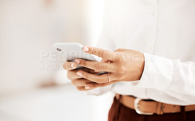 Buy stock photo Hands, phone and social media texting for communication or chatting against a blurred background. Hand of employee worker reading, typing or having a conversation on mobile smartphone at the office