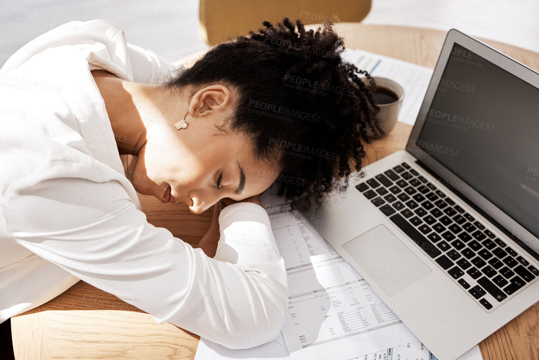 Buy stock photo Black woman, laptop and burnout for startup company, sleeping and overworked at desk. Female entrepreneur, African American girl or business pressure, tired or depressed for work, frustrated or sleep