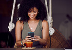 Coffee shop, online and black woman with coffee and phone in hand enjoy freedom, weekend and vacation. Happiness, relax and girl using smartphone for social media, typing message and internet in cafe