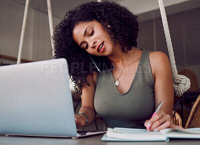 Buy stock photo Laptop, phone call and black woman writing in notebook, multitasking and working in cafe. Freelancer, tech and female remote worker with computer, books and mobile smartphone networking with contact.