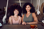 Friends portrait, happy and together at cafe for friendship, love and support. Black woman, relax and reunion happiness or relaxing quality time for relationship bonding with coffee at coffee shop