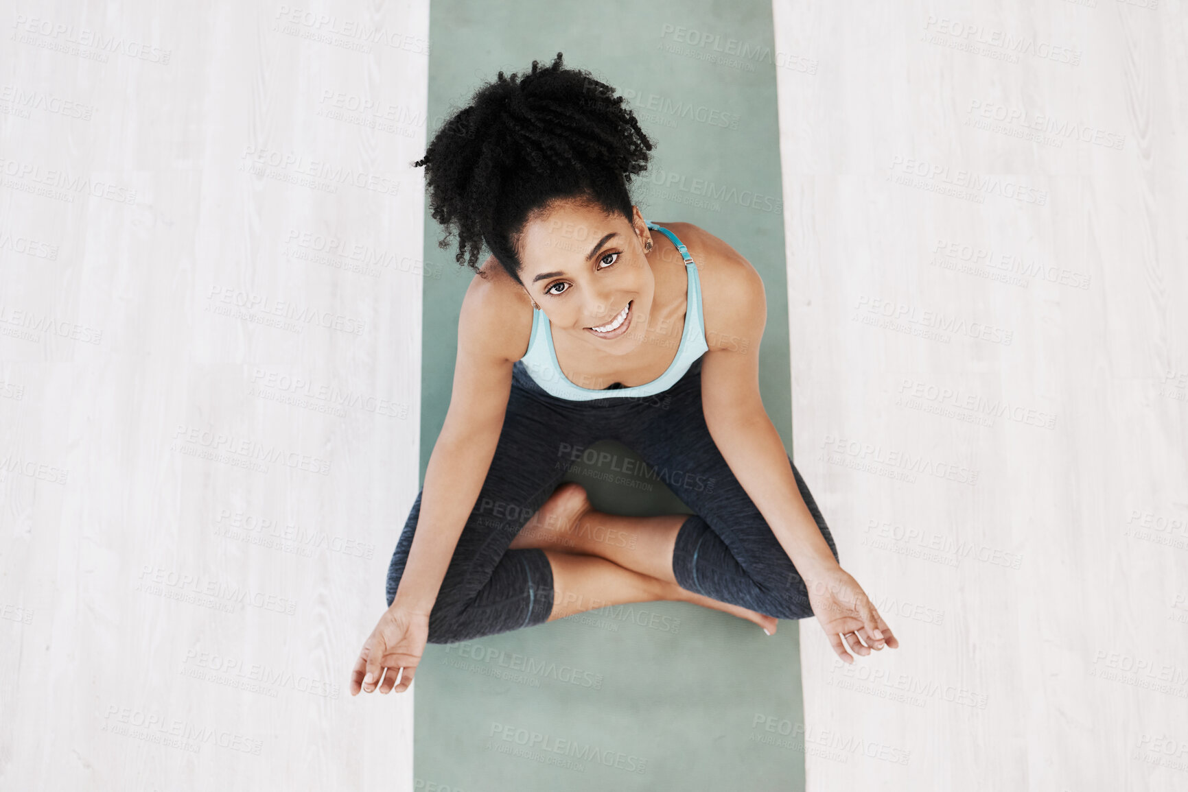 Buy stock photo Fitness, yoga and girl portrait top view on ground with mat for wellness, happiness and health. Spirituality, self care and healthy mindset of black woman relaxed on floor for awareness exercise.