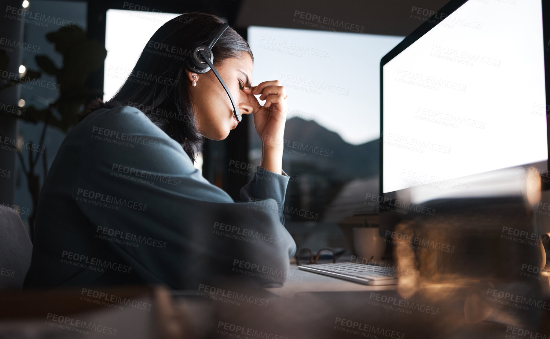 Buy stock photo Call center, woman and headache on computer in night, overtime and stress, burnout and desktop glitch, pain and crisis. Frustrated, anxiety and tired sales consultant, pc web problem and dark company