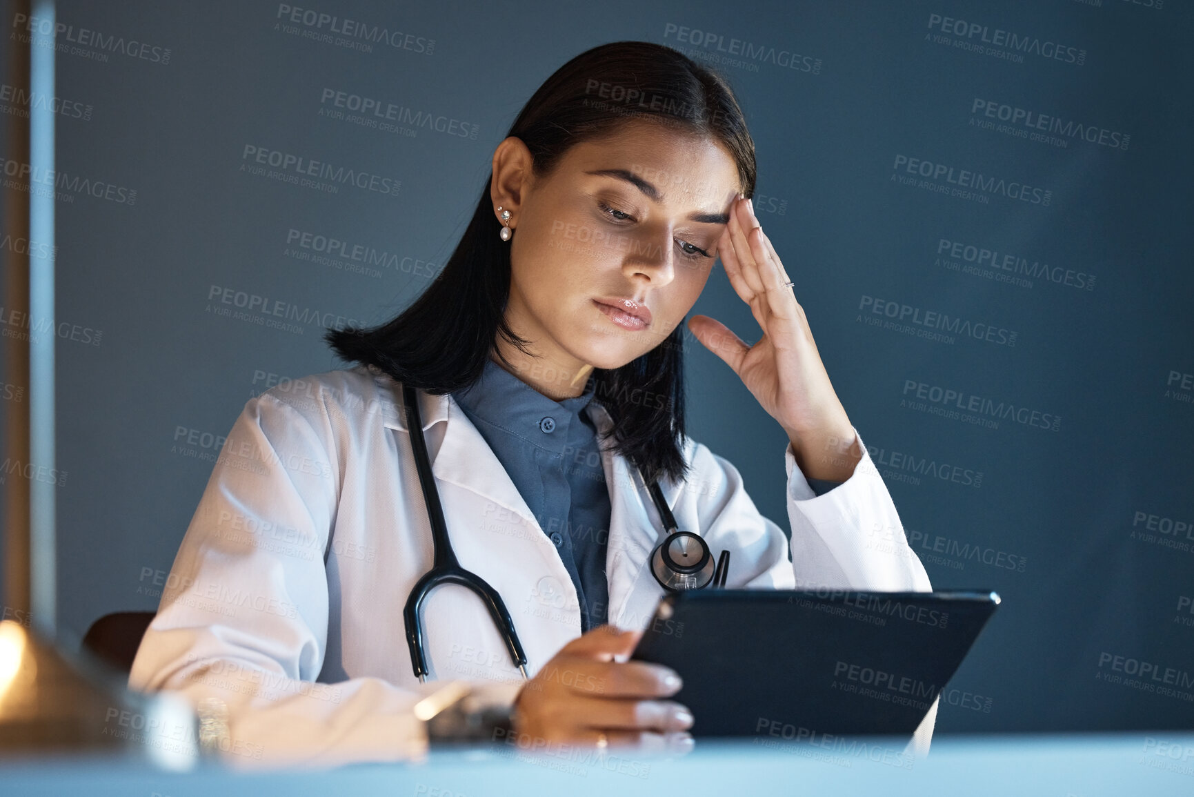 Buy stock photo Headache, doctor and work tablet stress of a healthcare, hospital and nurse worker looking at data. Burnout, tired and anxiety of a woman employee thinking and working on online surgery planning 