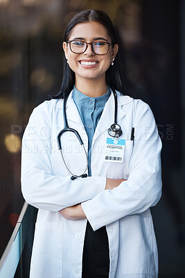 Buy stock photo Healthcare, doctor and portrait of woman with smile and glasses in hospital lobby on happy mission to help. Proud female leader in medical field with vision, trust and leadership at clinic in India.