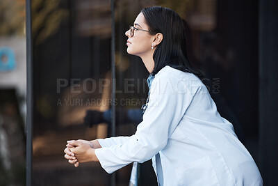 Buy stock photo Healthcare, idea and balcony with a doctor woman thinking while working at the hospital for medical or insurance. Health, treatment and contemplation with a female medicine professional at work