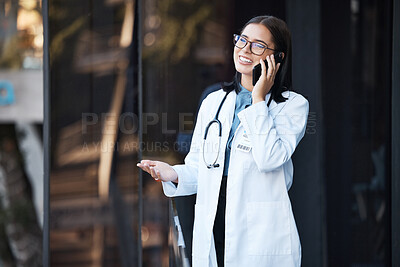 Buy stock photo Doctor, phone call and talking for communication, funny conversation and telehealth with contact outdoor in the city. Medical worker, healthcare expert or woman speaking on mobile smartphone on break