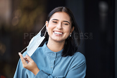 Buy stock photo Covid, freedom and finished with a woman mask removal with a smile outdoor in the fresh air. Health, safety and portrait with a female excited to stop or complete corona virus epidemic regulations