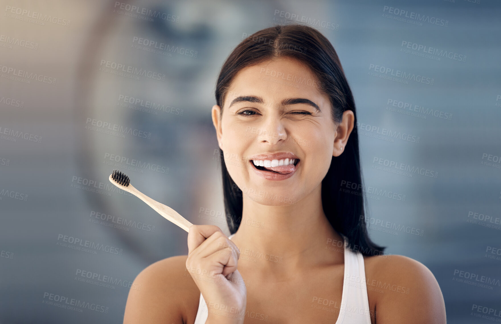 Buy stock photo Cleaning, wooden toothbrush and woman in bathroom with cute expression on face ready for brushing teeth. Dentistry, oral healthcare and girl with natural, organic and eco friendly dental care product