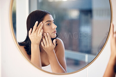 Buy stock photo Skincare, facial and woman by a mirror to check for acne breakout or pimples while cleaning face in bathroom. Beauty, wellness and healthy girl grooming or checking cosmetics results or prp progress
