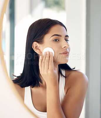 Buy stock photo Beauty, mirror reflection and woman with cotton pad for facial cleaning, makeup removal or home skincare routine. Health, wellness or face of model girl with cosmetics product for self care treatment