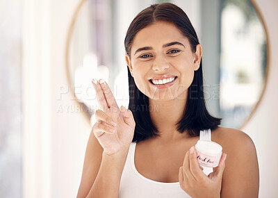 Buy stock photo Beauty, portrait and woman in a bathroom with face cream, product and skincare, routine and cleaning in her home. Face, skin and girl with sunscreen cosmetic treatment, facial and mockup background