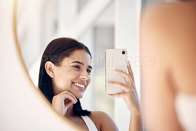 Buy stock photo Phone, happy and selfie of woman in bathroom with smile for natural social media beauty in mirror. Reflection, happiness and skincare of wellness influencer girl with smartphone in the morning.