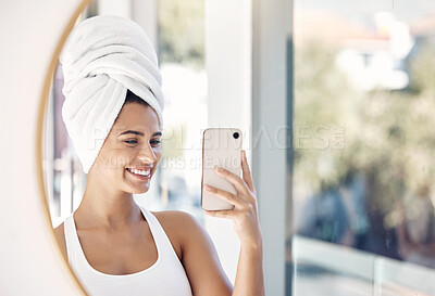 Buy stock photo portrait, phone selfie and woman, towel and bathroom for skincare, beauty and cleaning in mirror reflection. Face, girl and smile for picture after facial treatment, grooming and hygiene with a smile