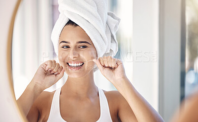 Buy stock photo Dental floss, teeth and woman in mirror of bathroom for shower, cleaning and morning routine. Beauty, cosmetics and wellness with face of girl at home for oral hygiene, fresh breath and mouth health