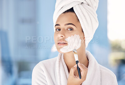 Buy stock photo Woman, skincare brush and facial cream, portrait and cosmetic beauty routine. Moisturizer, health and model in morning face treatment to relax in home with towel, self care and cosmetic treatment