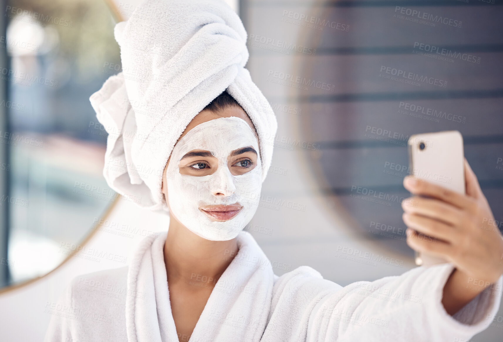 Buy stock photo Woman, facial mask and phone selfie after morning shower, wellness and healthy skincare, makeup product and cleaning in bathroom at home. Beauty, face mask cosmetics and female taking photo on mobile