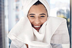 Face, towel and portrait of woman, shower or bathroom, aesthetic and body care, wellness or beauty. Happy, morning and smile young girl cleaning face, drying skincare and facial dermatology cosmetics