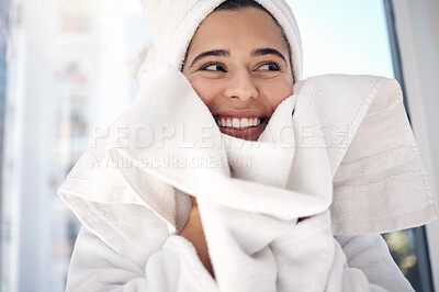 Buy stock photo Spa, towel and healthy happy woman with a wellness, beauty and skincare routine in her bathroom. Happiness, smile and girl with luxury cosmetic facial skin treatment for health, self care and hygiene