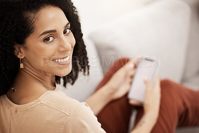 Buy stock photo Black woman, happy with smartphone and smile in portrait,   relax on living room sofa with social media or texting. Communication, technology and online, relaxing at home with 5g network and mobile.