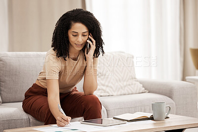 Buy stock photo Phone call, documents and writing with a woman freelancer remote working from home on her startup business. Communication, coffee and technology with a female entrepreneur at work in the living room