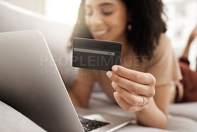 Buy stock photo Hand, credit card and online shopping with a black woman customer using her laptop in the living room. Finance, computer and accounting with a female consumer spending money through ecommerce