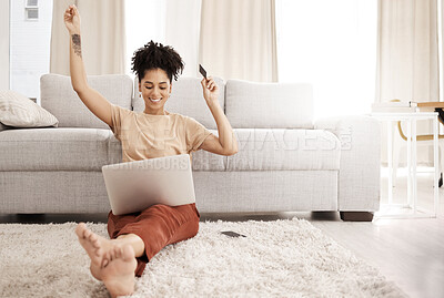 Buy stock photo Black woman, laptop and happy with credit card, ecommerce and approved loan in lounge. Young female, lady and digital device for success, online banking and happiness with smile, joy and living room.