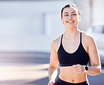 Exercise, woman and running, city and mockup, fitness and energy, healthy lifestyle or outdoor wellness. Portrait of happy athlete, runner and motivation for urban cardio workout, sports and training