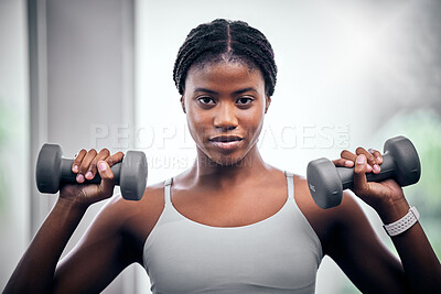Face portrait, dumbbells and black woman training in gym for muscle,  strength and power. Healthcare, energy and female bodybuilder weight  lifting in fitness center for wellness, workout or exercise.
