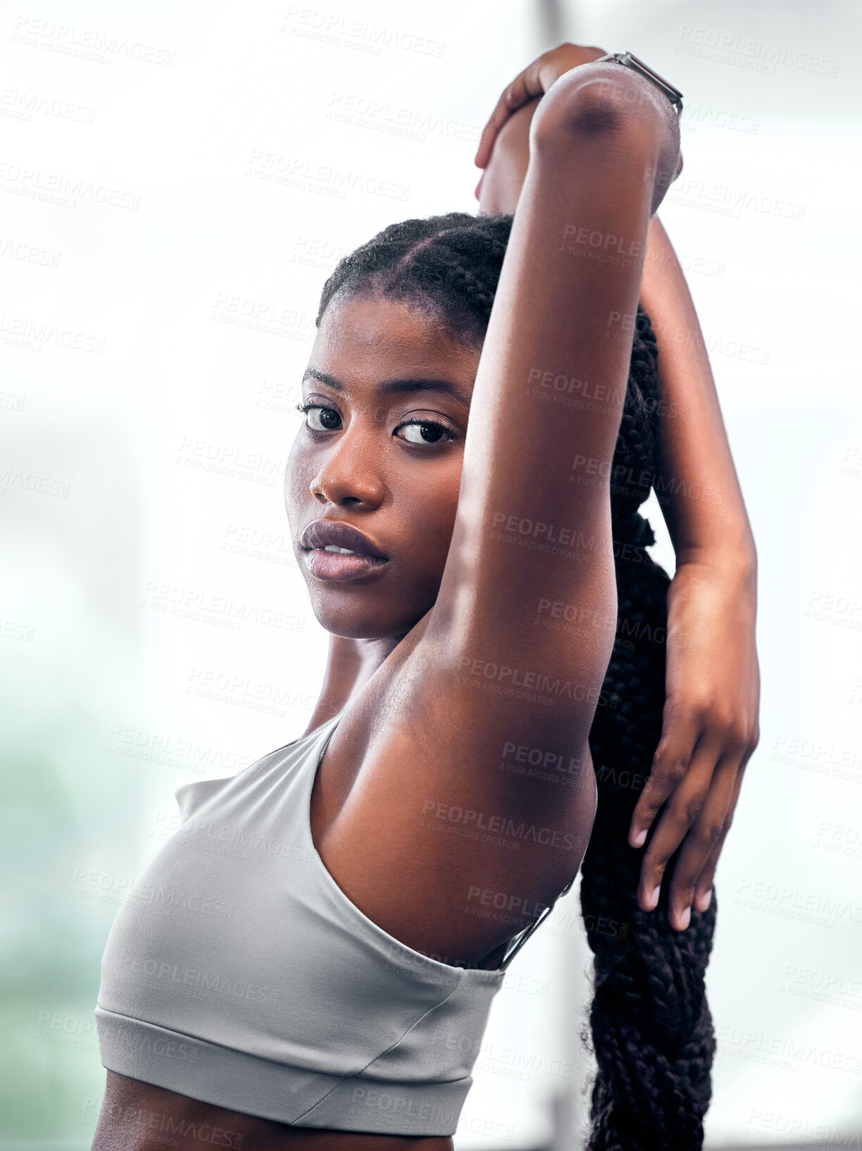 Buy stock photo Workout, portrait and black woman stretching arm for self care, wellness and health at club. Exercise, training and athlete warm up in gym for body cardio with serious and determined face.