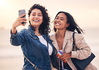 Buy stock photo Black woman, friends and selfie at beach for sunset, bonding and summer happiness after work together. Women, smartphone and happy photo for social media, summer and ocean in dusk sunshine with smile