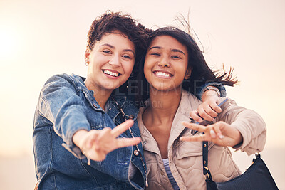 Buy stock photo Lgbtq, couple and peace sign portrait of interracial lesbian women together on travel adventure. Summer, friends and smile of people in miami on vacation with happiness, hug and freedom lifestyle