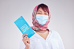 Covid, Islam woman and mask for vaccine card, protection and healthy for wellness, happy and on grey studio background. Muslim lady, face cover and vaccination proof for travel, safety and corona.