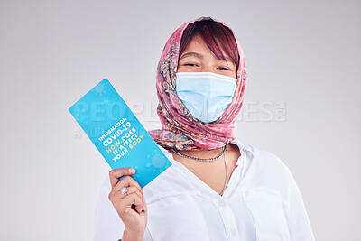 Buy stock photo Covid, Muslim woman and mask for vaccine card, protection and healthy for wellness, happy and on grey studio background. Islam lady, face cover and vaccination proof for travel, safety and corona.