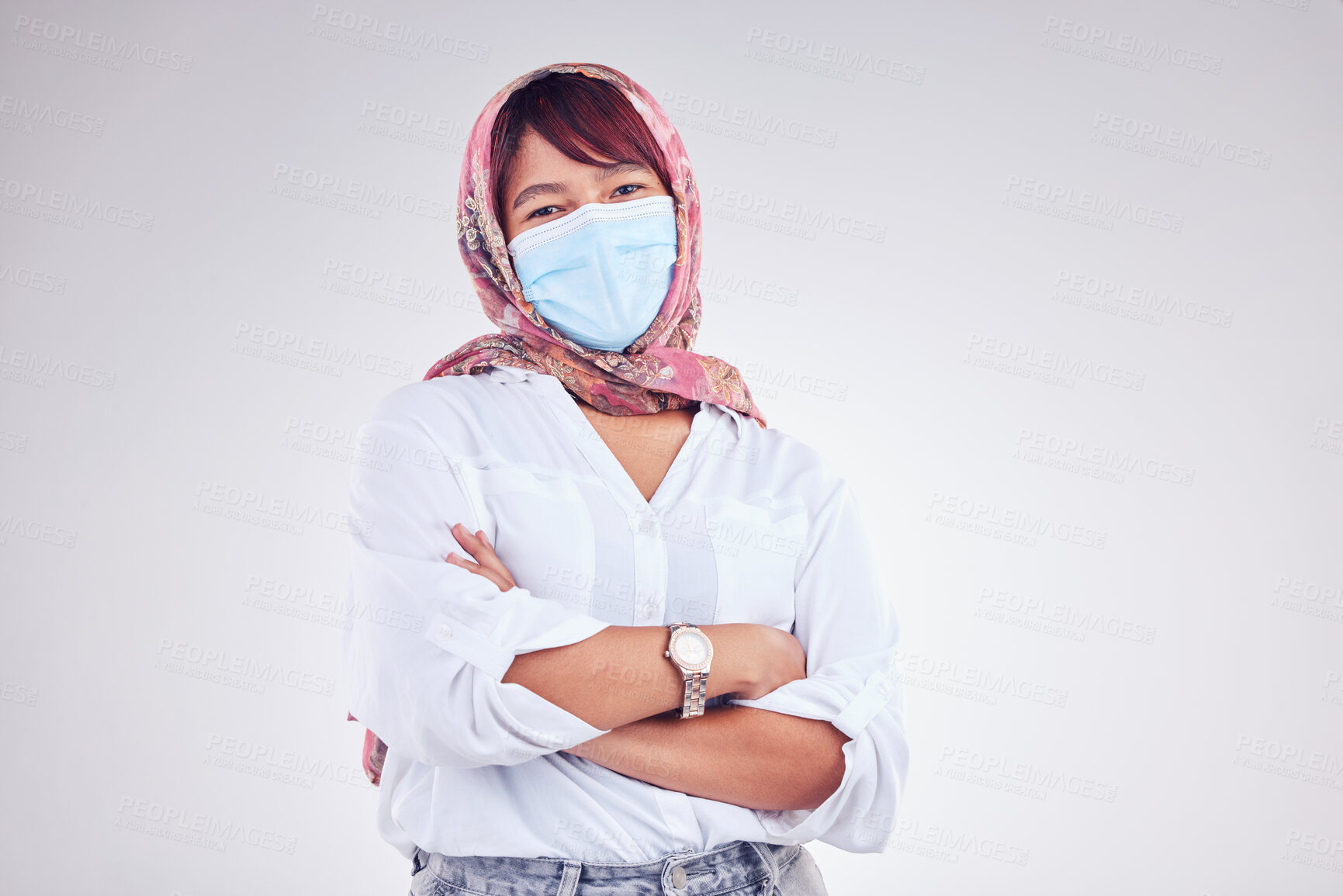 Buy stock photo Covid, Muslim and portrait of woman with mask in white background studio for safety and virus protection. Healthcare, covid 19 and Islamic female with face mask, hijab and crossed arms in pandemic