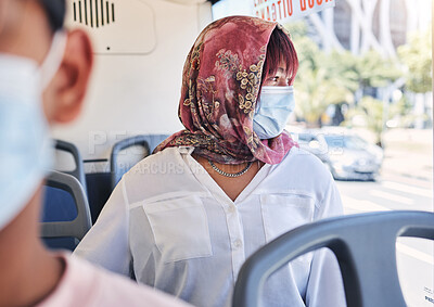 Buy stock photo Woman, muslim and bus with mask, covid and healthcare on transport in city, town or metro by window. Islam lady, covid 19 and ppe on transportation for travel, urban adventure or thinking of safety